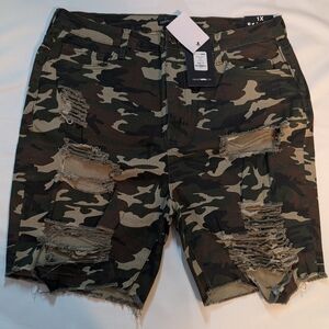 Fashion Nova camo distressed denim shorts